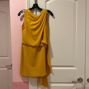Halston mustard colored mini dress with left sleeve drape
